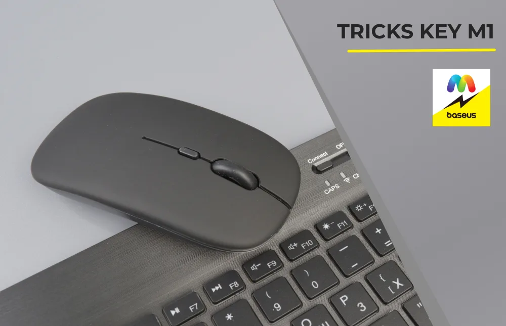 Крупный план мыши и верхней части клавиатуры Tricks Key M1